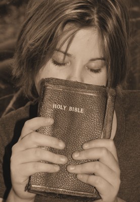 woman holding a bible